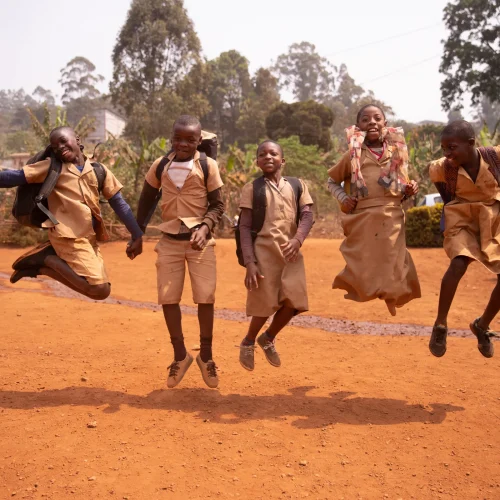 group-of-african-children-playing-and-jumping-up-a-2025-03-08-17-11-29-utcxs
